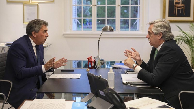 Claudio Ambrosini junto a Alberto Fernández